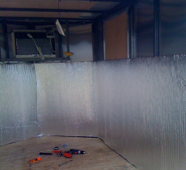 A layer of reflective bubble wrap is put on first.